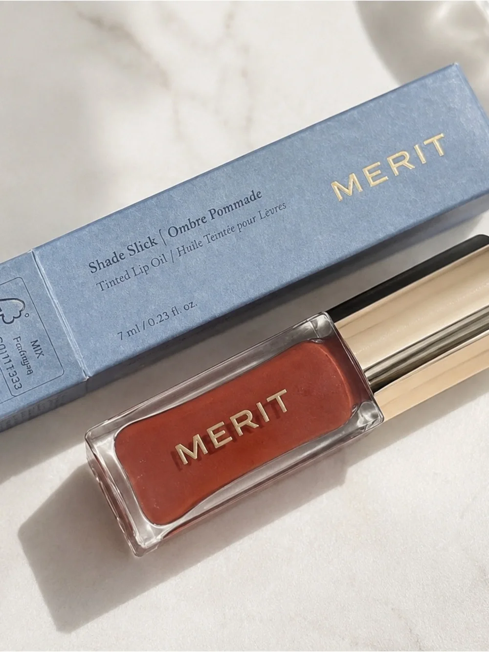 Merit lip oil